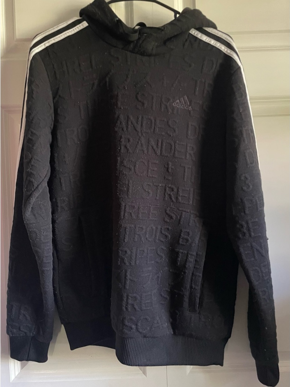 Adidas Typography Embossed hoodie, black, size small.